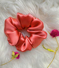 silk sruchies coral-red collor in white